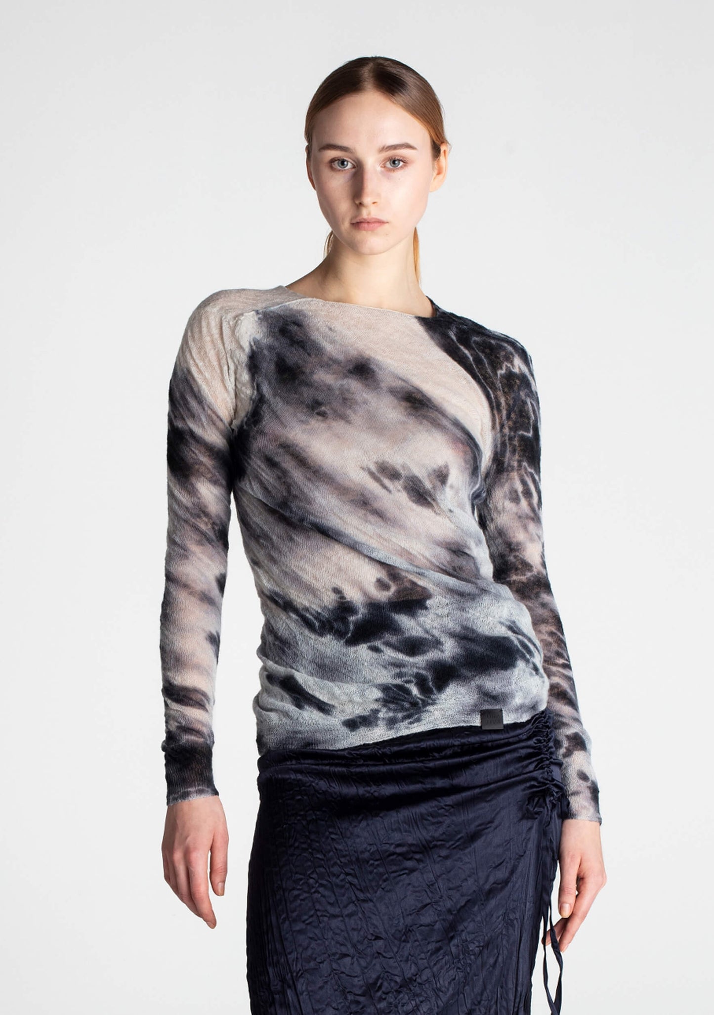 Soft, feather-light wool jumper with unique black Shibori-dyed patterns