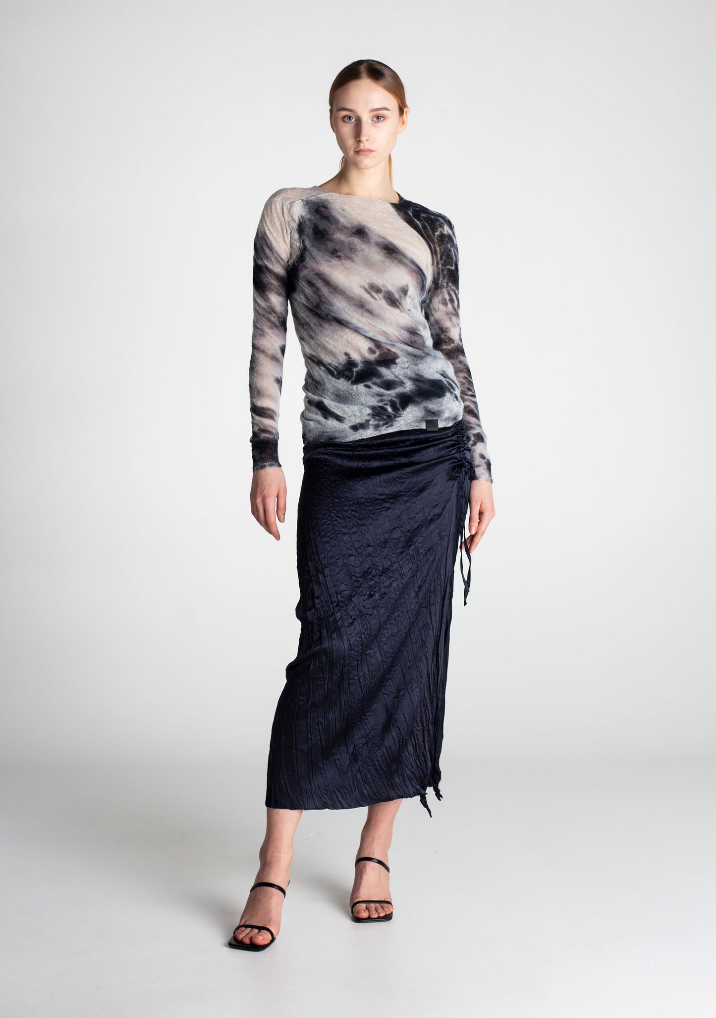 Soft, feather-light wool jumper with unique black Shibori-dyed patterns