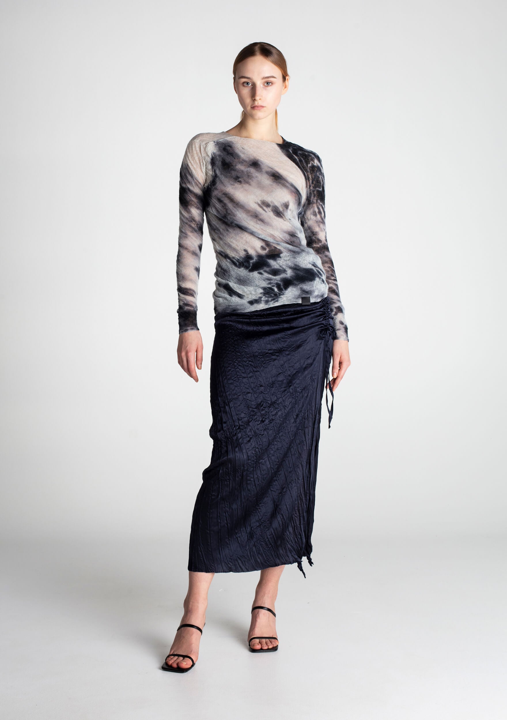 Soft, feather-light wool jumper with unique black Shibori-dyed patterns