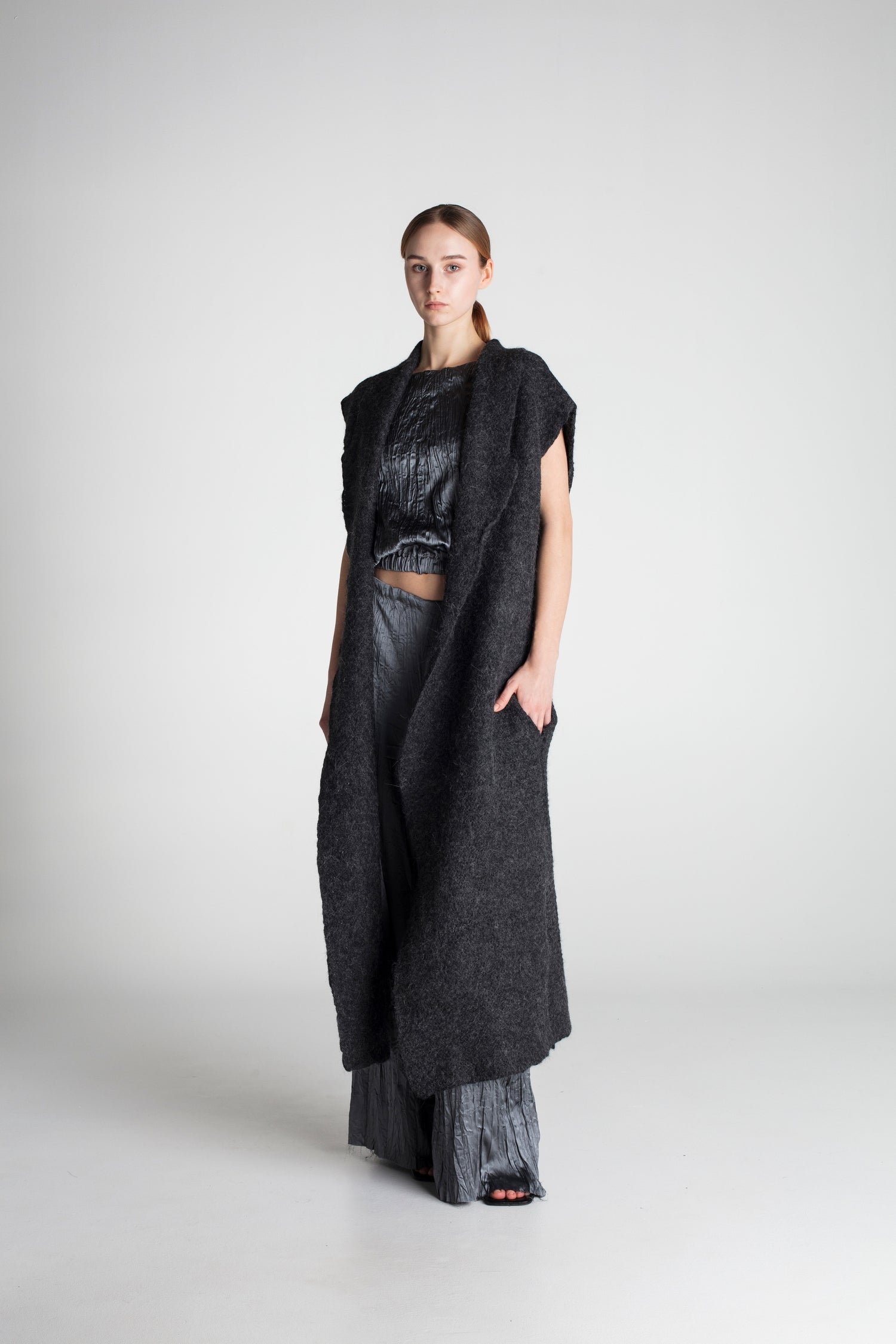 sustainable wool sleeveless longcoat in charcoal